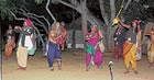 tRIBAL SOUNDS: Dr Balagurumurthys play Budganada being presented as part of the 52nd Hunnime Hadu programme on Thursday night on the premises of the Adima Samskritika Sanghatane on the outskirts of Kolar. DH PHOTO