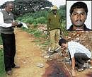 Crime scene: Police officials inspecting the spot at Yeshwantpur railway grounds where Prashanth (inset) was killed in an encounter. DH Photo