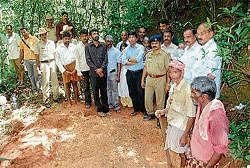 Exhumation being carried out to find the mortal remains of Umesh Rai in the presence of Assistant Commissioner Dr Harish Kumar in Puttur on Sunday.