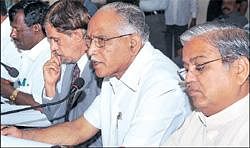 Chief Minister B S Yeddyurappa at a meeting with the State- level vigilance committee in Bangalore on Monday. Social  Welfare Minister A Narayanaswamy, Chief Secretary S V Ranganath and Irrigation Minister Govind Karjol are seen. DH Photo