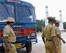 On Alert: Policemen posted near a mosque at Chamarajpet in Bangalore on Wednesday, in the wake of the verdict on the Ayodhya issue to be delivered by the Allahabad High Court on Thursday. DH Photo