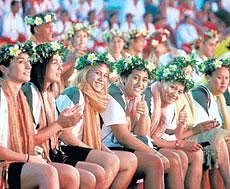In high spirits:  Team members from Cook Islands enjoying themselves at the Games Village in New Delhi on Wednesday. PTI