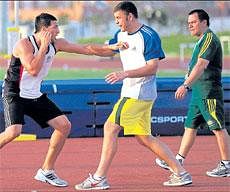 friendly fire!: Australian athletes brace themselves at the Games Village on Thursday for the bigger challenges ahead. DH photo / Kishor Kumar Bolar