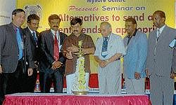 Relevant: Medical Education and district in-charge Minister S A Ramdas inaugurating the seminar at Senate Hall in Mysore on Thursday. Chairman, BAI, Mysore centre U M Gurushanthappa, chairman, organising committee, M G Somashekar, chairman, CREDAI, Mysore centre, V K Jagadish Babu, honourary secretary, BAI, M C Mallikarjun and honourary secretary, CREDAI, T N Hemanth are seen. DH Photo