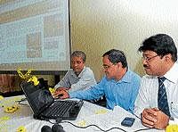 Divisional Railway Manager, SWR, Mysore division, B B Verma launching the website of Mysore railway station on Thursday. Senior divisional commercial manager, SWR, Dr Anup Dayanand Sadhu and ADRM, Goutham Majumder look on. DH photo