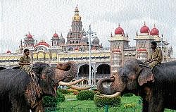 picture perfect Dasara jumbos Vikram and Harsha salute at the Palace premises. DH photo