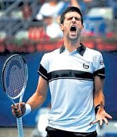 War Cry: Novak Djokovic is ecstatic after getting past Gilles Simon in the China Open on Friday. AP