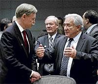 IMF Managing Director Dominique Strauss-Kahn (right) with World Bank Group President Robert Zoellick during the Development Committee meeting at the IMF World Bank 2010 Annual Meetings in Washington, on Saturday, AP