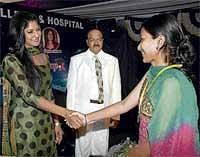 Happy:  Yagna Shetty giving away the medals.