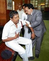 Victim: Marshal Linganna who was injured when the Opposition members beat him up in the Assembly. DH photo