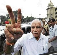 Over the moon: Chief Minister B S Yeddyurappa rejoicing in his victory in front of the Vidhana Soudha on Monday. DH photo