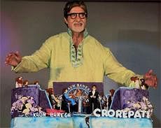Amitabh Bachchan celebrates his 68th birthday during a promotional event of the TV episode 'Kaun Banega Crorepati' in Mumbai on Monday. PTI Photo