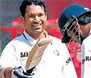 Evergreen: Sachin Tendulkar acknowledges the cheers after completing his sixth double century on Tuesday. DH photo