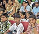 Tiny philatelists:  Schoolchildren at the Philately Quiz organised by the India Post to mark World Philately Day at the General Post Office in the City on Wednesday. DH Photo