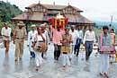 The ornaments used to embellish goddess Cauvery being brought in a procession from Bhagamandala to Talacauvery on Friday.