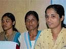 Mainstream: The three women naxals who surrendered before Deputy Commissionerin Chikmagalur on Friday.   DH Photo