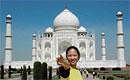 Bedazzled! Malaysias Commonwealth Games participant Peichin Bibi soaks in the Taj Mahal experience. PTI