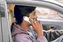 Dangerous:  Many people talk on the mobile phone while driving.