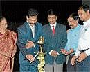 Principal District and Sessions Court Judge H P Sandesh  inaugurating World Mental Health Day organised at the MMC&RI  platinum jubilee hall in Mysore on Wednesday. Medical Superintendent, K R Hospital, Dr Geetha Avadhani, Prof Venkatesh Kumar are seen. DH Photo