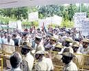 Demanding justice: Farmers stage a protest outside the Deputy Commissioners office in Chikkaballapur on Wednesday. DH Photo
