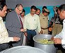 Taking stock:  Chairman,State Human Rights Commission (SHRC) S R Nayak  inspecting the quality of food at  Destitute Rehabilitation Centre in Mysore on Thursday.