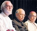 Breaking barriers: (From L) Archbishop of Canterbury Rowan Williams, Governor H R Bhardwaj and Archbishop of Bangalore Bernard Moras at the public reception at Bishop Cotton Boys School organised by the Church of South India in Bangalore on Thursday. DH Photo