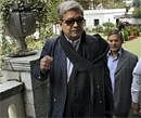 Senior journalist Dileep Padgaonkar and Information Commissioner M M Ansari, the interlocutors appointed by the Centre to find a solution to Jammu and Kashmir issue, arrive in Srinagar to start a dialogue process with different shades of opinions, on Saturday. PTI Photo