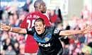 Javier Hernandez celebrates after scoring his second goal in Manchester Uniteds 2-1 win over Stoke City in the English Premier League on Sunday. AFP