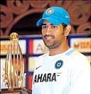Skipper Mahendra Singh Dhoni with the trophy after India won the one-day series 1-0. AFP