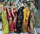 Vivid: Models displaying the sari collection.