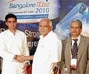 Chief Minister B S Yeddyurappa,  welcomes Union Minister of State for Communications and IT  Sachin Pilot at Bangalore IT.biz 2010 as Infosys CEO & Managing Director S Gopalakrishnan in Bangalore on Thursday, DH Phot