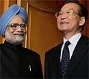 Prime Minister Manmohan Singh and Chinese Premier Wen Jiabao prior to a bilateral meeting on the sidelines of the 17th summit of the Association of Southeast Asian Nations (ASEAN) in Hanoi, Vietnam on Friday. PTI