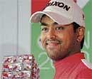 Smiling Champ: Anirban Lahiri displays the trophy after winning the BILT Open golf  tournament at the KGA Course in Bangalore on Saturday. DH photo/ P Samson Victor