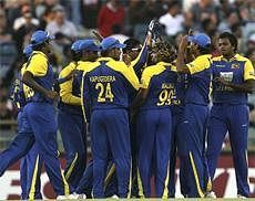 Sri Lankan players celebrate dismissing Australia for 133 runs in their 20/20 cricket match at the WACA in Perth, Australia on Sunday. (AP Photo)