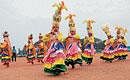 A troupe performing cultural programmes at Kannada Rajyotsava celebrations, at Nehru Maidan on Monday. DH photo