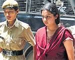 Shubha being escorted to court in this file photo.  DH photo