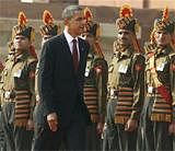 President Barack Obama reviews an honor guard as he takes part in an official arrival ceremony at Rashtrapati Bhavan in New Delhi on Monday.AP