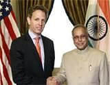 U.S. Treasury Secretary Tim Geithner (L) shakes hands with Indian Finance Minister Pranab Mukherjee at their meeting at the Treasury in Washington June 22, 2010. Reuters File Photo