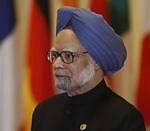 India's Prime Minister Manmohan Singh arrives for the opening plenary session of the G20 Summit at COEX convention center in Seoul, South Korea. AP