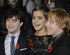 British actors Daniel Radcliffe, Emma Watson and Rupert Grint, from left, arrive at a cinema in London's Leicester Square for the World Premiere of Harry Potter and the Deathly Hallows Part 1. AP