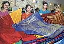 Colourful: Some of the saris on display.