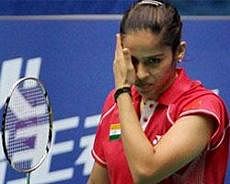India's Saina Nehwal looks dejected after losing to Hong Kong's Yip Py during the quarterfinal match of the women's singles badminton event of 16th Asian Games at Tianhe Gymnasium in Guangzhou, China on Thursday. PTI