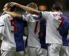Blackburn Rovers players celebrate a goal against Aston Villa during their English League Cup match at Villa Park in Birmingham, central England, September 22, 2010. Reuters File Photo