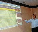 An official explaining about SCADA at KPTCL Bhavan, in Mysore on Tuesday.  DH photo
