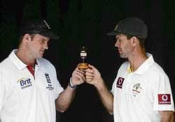 Its mine! England captain Andrew Strauss (left) and his Australian counterpart Ricky Ponting with the Ashes urn. Reuters