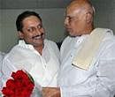 Andhra Pradesh Chief Minister-designate Kiran Kumar Reddy with his predecessor K Rosaiah during a meeting in Hyderabad on Wednesday night. PTI