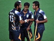 Indian players celebrate their victory against South Korea in the bronze medal field hockey match at the 16th Asian Games in Guangzhou . India defeated South Korea 1-0. AFP