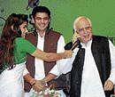 Union Ministers Kapil Sibal and Sachin Pilot during the launch of Mobile Number Portability in Rohtak, Haryana, on  Thursday. PTI