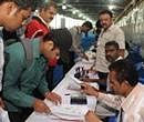 People filing IT returns. DH file photo