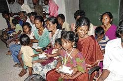 Freedom: Workers and children rescued from a quarry at Vittal near Mangalore on  Wednesday. dh photo